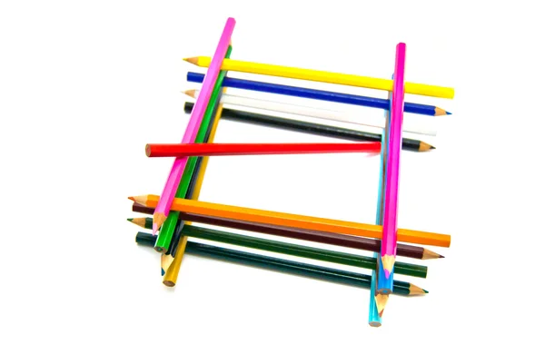 Grade de lápis diferentes em branco — Fotografia de Stock