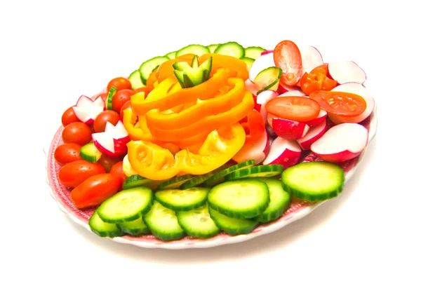 Různé zeleniny na talíři — Stock fotografie