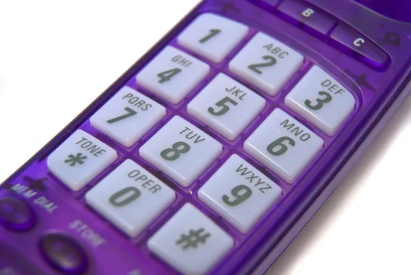 紫の携帯電話のクローズ アップ — ストック写真