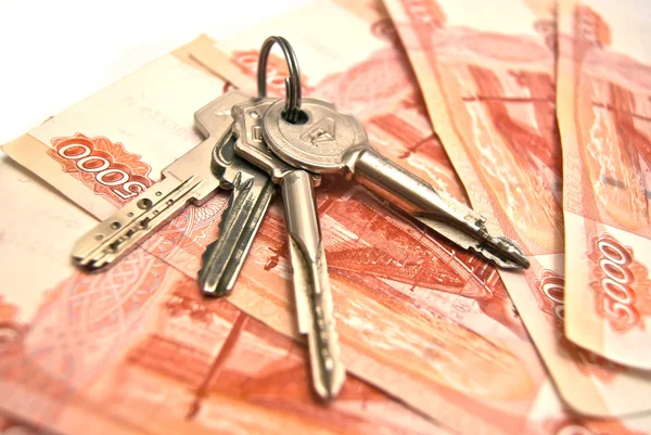 Keys and banknotes background — Stock Photo, Image