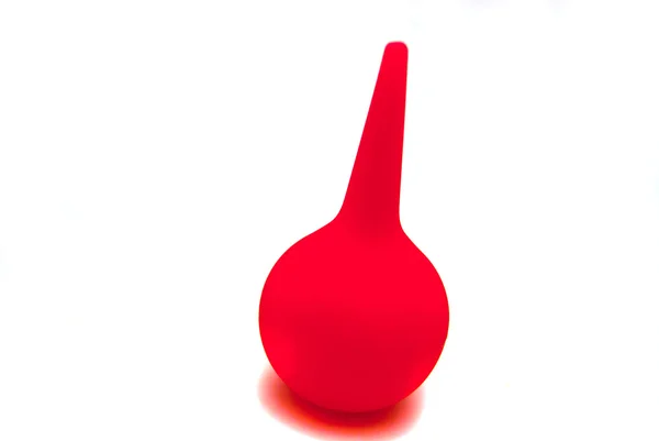Red enema syringe — Stock Photo, Image