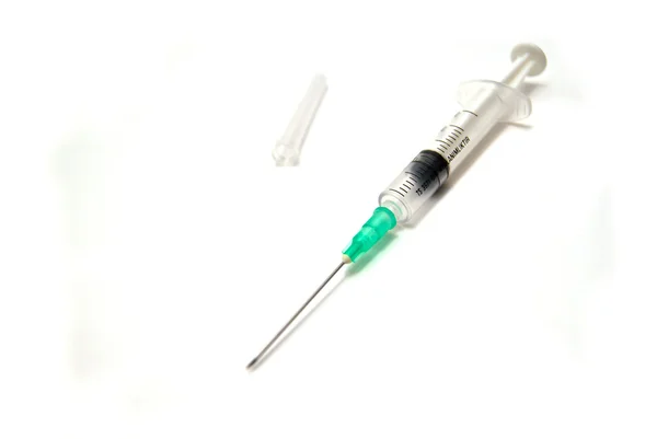 Syringe and cap — Stock Photo, Image