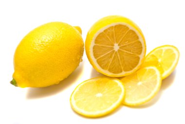 Fresh lemon and lemon slices clipart