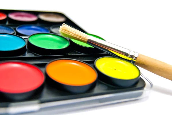 Watercolors and brush on white — Stock Photo, Image