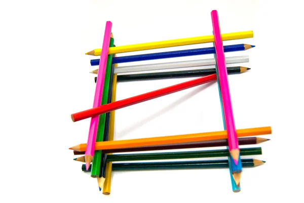 Grid of colored pencils on white — Stock Photo, Image