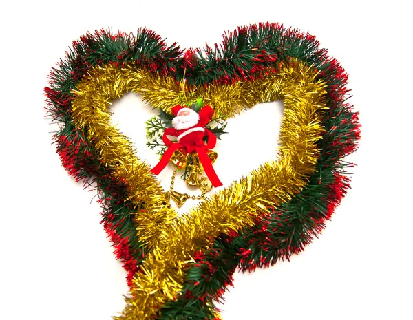 Minuscule coeur et figurine de Père Noël Photos De Stock Libres De Droits