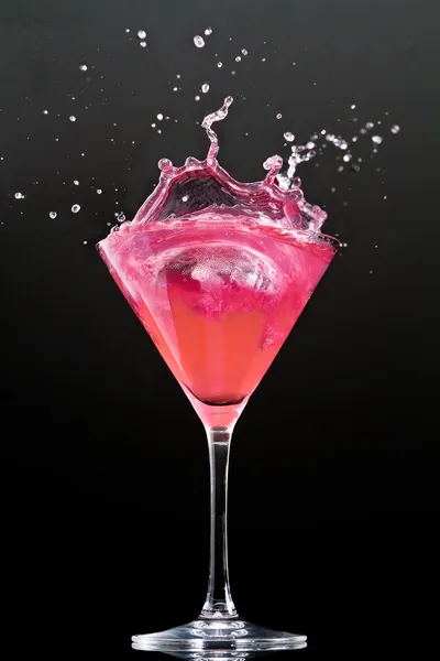 Cosmopolitan cocktail drink isolation on a black — Stock Photo, Image