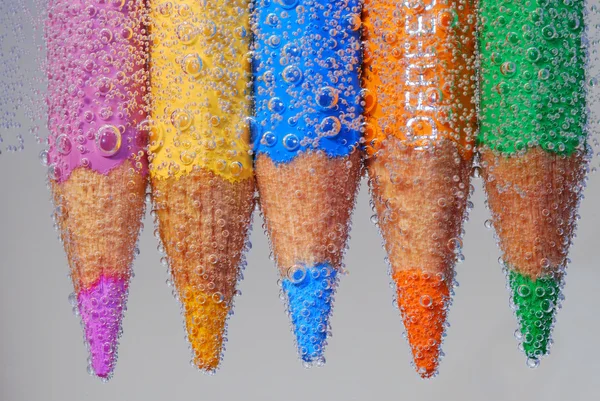 Colored pencil with many bubble — Stock Photo, Image