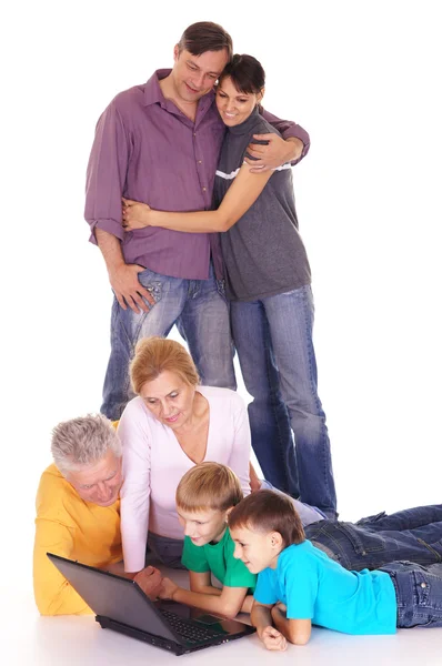 Familia con portátil — Foto de Stock