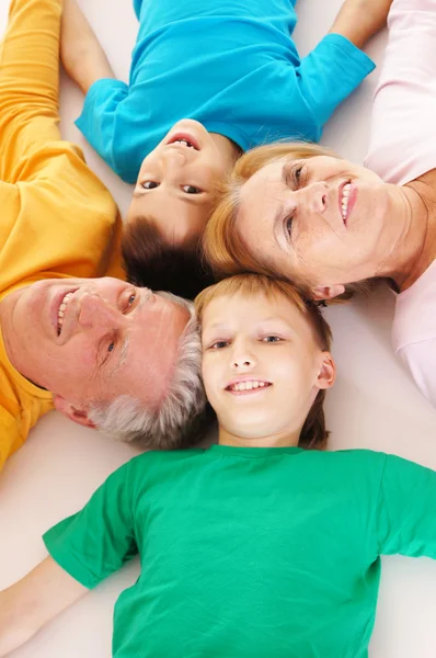 Family on floor — Stock Photo, Image