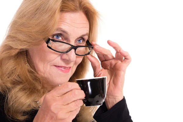 Aged woman with cup — Stock Photo, Image