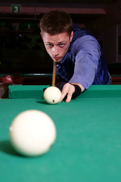 stock image Man playing billiards