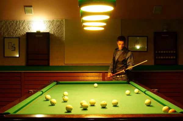 Man at billiards table — Stock Photo, Image