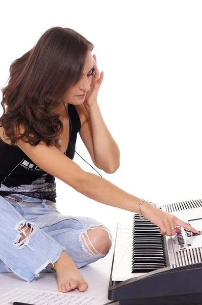 Girl with piano — Stock Photo, Image