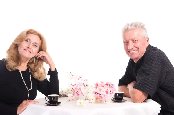 Oude paar aan tafel — Stockfoto