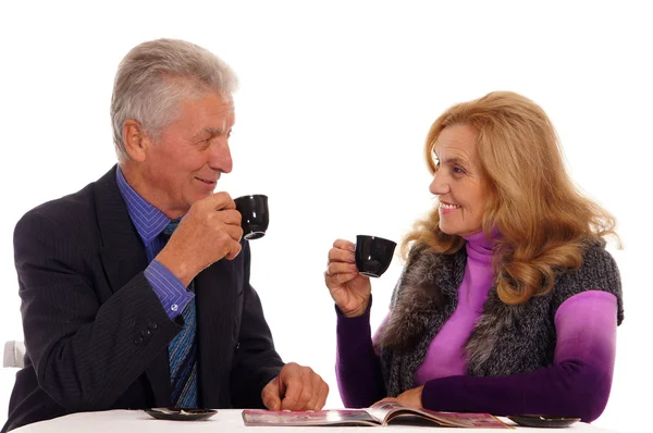 Äldre par på bordet — Stockfoto