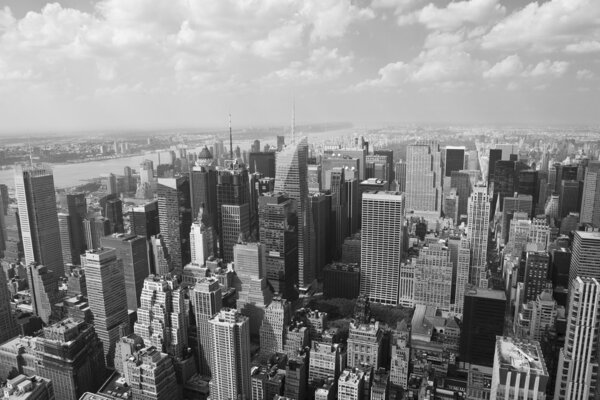 Manhattan cityscape viewed from top of empire state building, black and white, new york, united states.