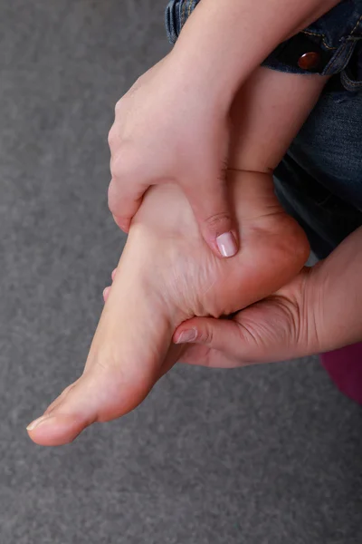 Stock image Massage for a tired foot