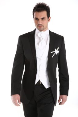 Handsome young man in tuxedo clipart