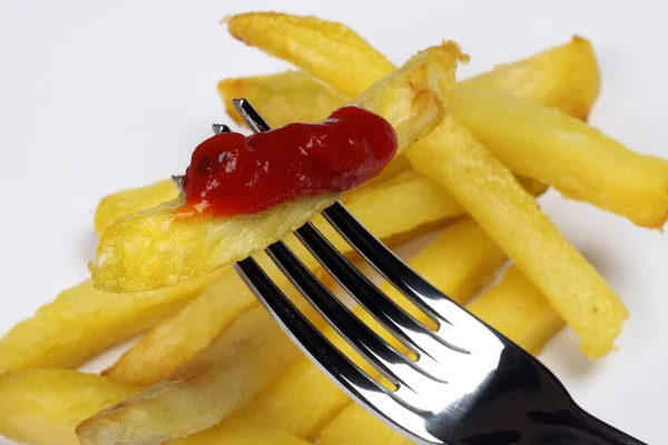 Plug and fried potato with sauce — Stock Photo, Image