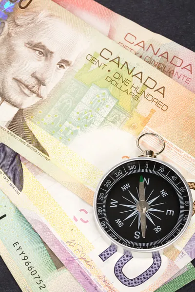Kompas a kanadský dolar — Stock fotografie