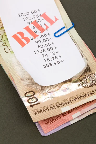 Bills and canadian dollars Stockfoto