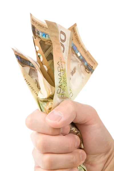 Una mano llena de dólares canadienses — Foto de Stock