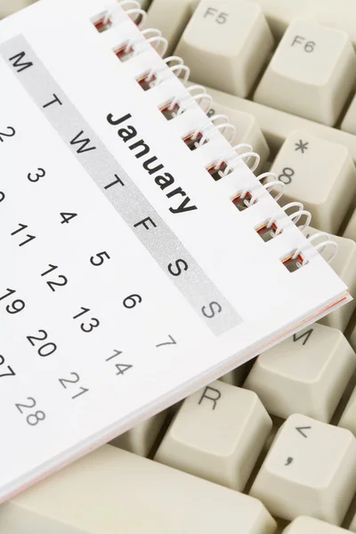Календарь и клавиши — стоковое фото