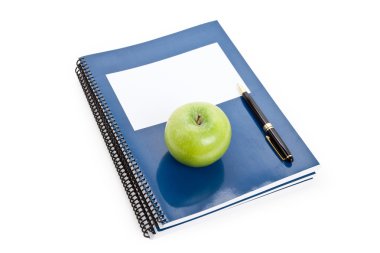 groene appel en leerboek