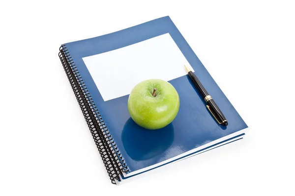 Groene appel en leerboek — Stockfoto