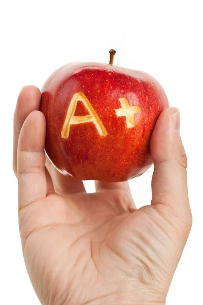Kırmızı elma ve artı işareti — Stok fotoğraf