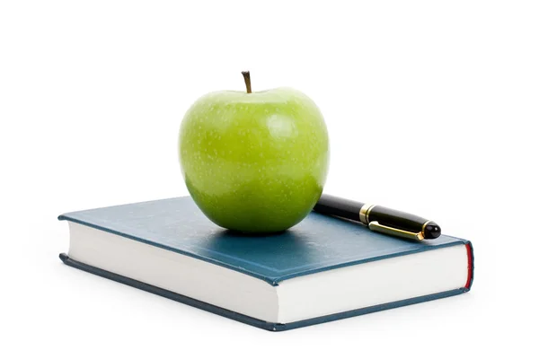 Manzana verde y libro de texto — Foto de Stock