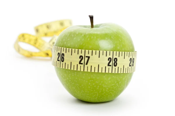 Pomme verte et ruban à mesurer — Photo