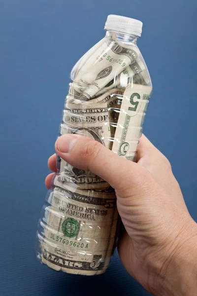 Plastic Bottle and Dollar — Stock Photo, Image
