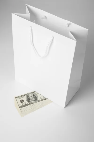 Bevásárló táska, és a dollár — Stock Fotó
