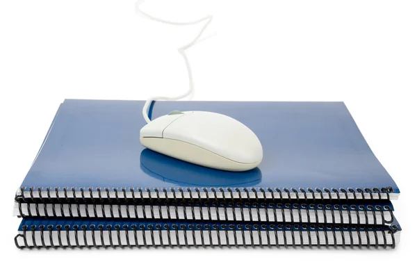 Blue school textbook and computer mouse — Stock Photo, Image