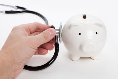 Stethoscope and Piggy Bank clipart