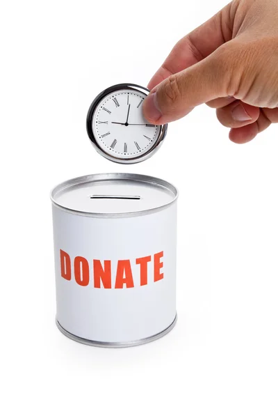 Spendenbox und Uhr — Stockfoto