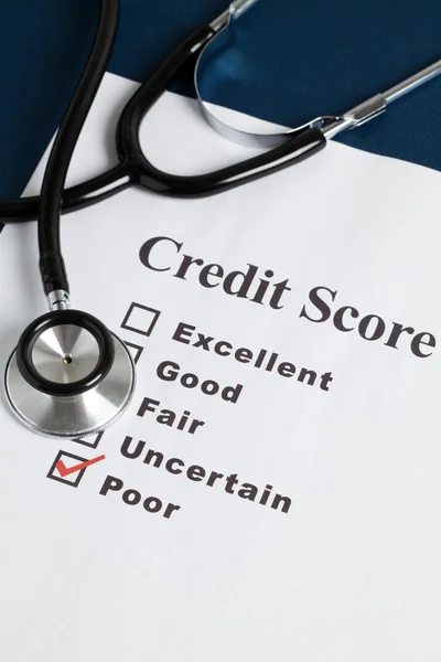 Stethoscope and Credit Report — Stock Photo, Image