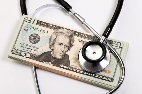 Stethoscope and dollar — Stock Photo, Image