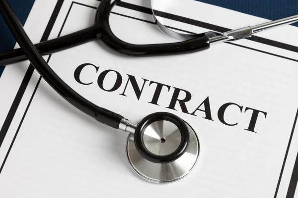 Stethoscope and Contract — Stock Photo, Image