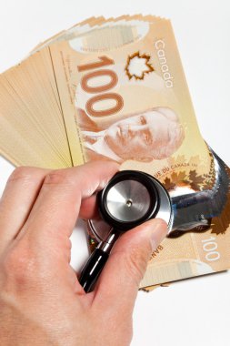 Stethoscope and Canadian dollar clipart