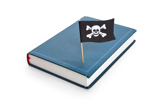 Boek en piraat vlag — Stockfoto