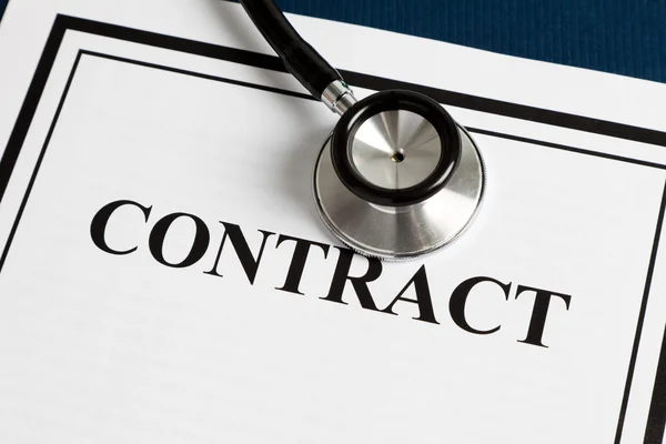 Stethoscope and Contract — Stock Photo, Image