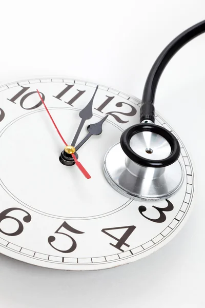Stethoscope and Clock — Stock Photo, Image