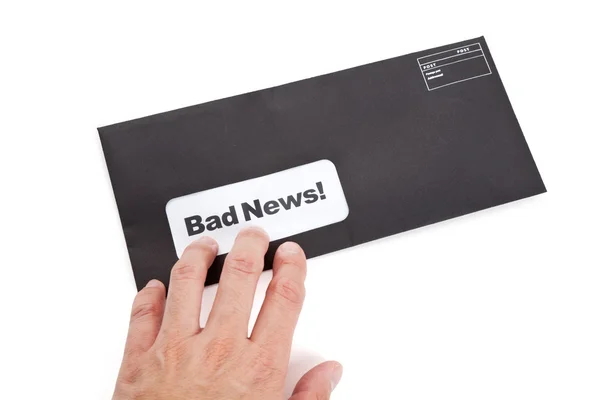 Плохие новости и конверт — стоковое фото