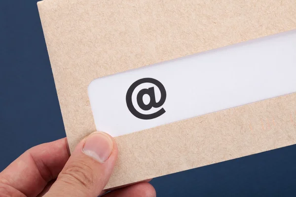 Símbolo e envelope — Fotografia de Stock