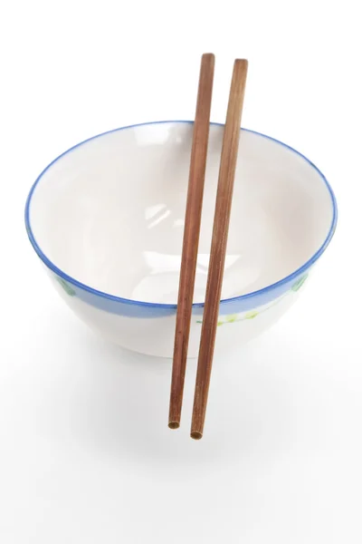 Eetstokjes en bowl — Stockfoto