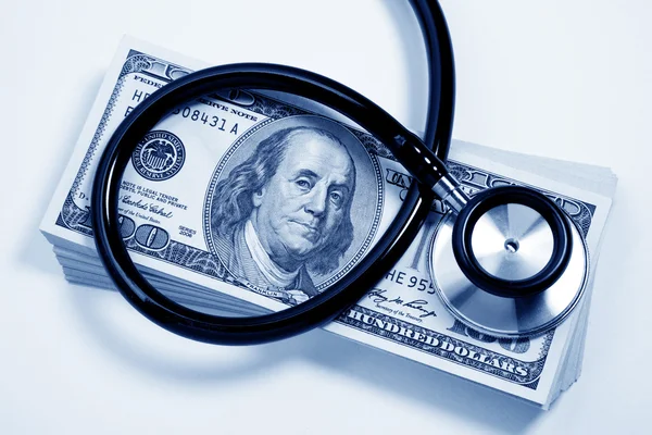 Stethoscope and dollar — Stock Photo, Image