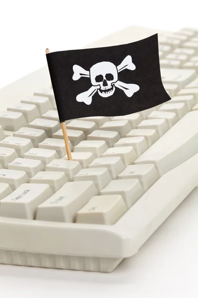 Пірат прапор і клавіатура комп'ютера — стокове фото